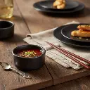 Porceletta-Rustic-Black-Reactive-Glaze-Porcelain-Small-Mezza-Sauce-Dish-6.4cm-2.5Inch-Lifestyle-1.jpg