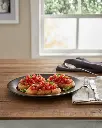 Porceletta-Rustic-Black-Reactive-Glaze-Porcelain-Oval-Plate-12Inch-Lifestyle-01.jpg
